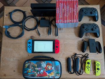 Console Nintendo Switch con 13 giochi e accessori.