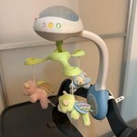 Giostrina musicale con proiettore luci per culla