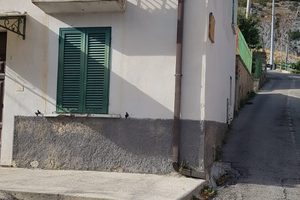 Terreni agricoli e casa in paese