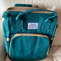 Zaino fasciatoio verde con lettino pieghevole