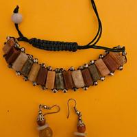 Parure bracciale e orecchini
