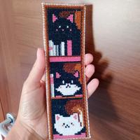 segnalibro gatti nella libreria 