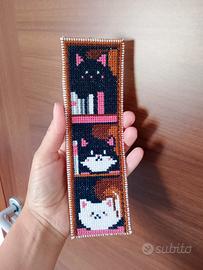 segnalibro gatti nella libreria 