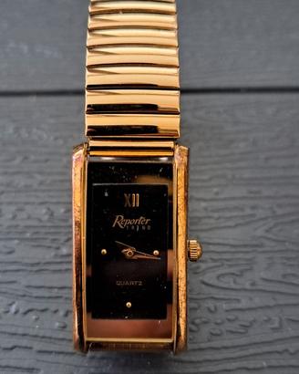 Orologio Reporter elasticizzato oro sfondo blu