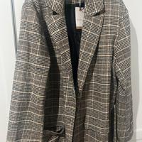 Cappotto nuovo con etichetta