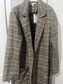 Cappotto nuovo con etichetta