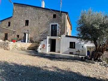 Caseggiato, uliveto, aranceto, sorgente capannoni