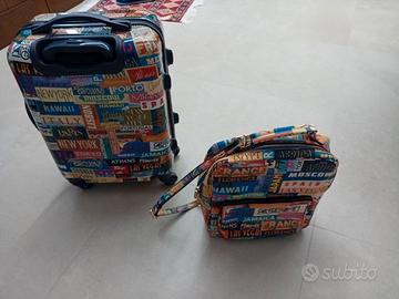 Borsa con tracolla e valigia parfois
