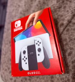 Nintendo Switch OLED + Accessori + Giochi