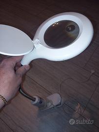 lampada a pinza sa tavolo con lente