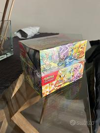 Pokemon Box Mini Tin Evoluzioni Prismatiche selead