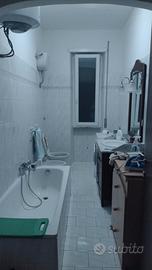 Stanza singola con letto matrimoniale