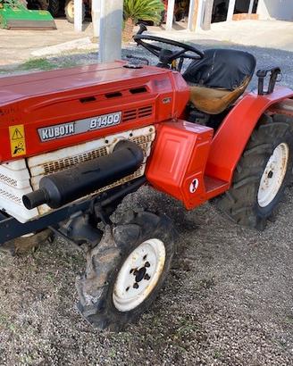 Trattore frutteto usato Kubota B1400 con fresa