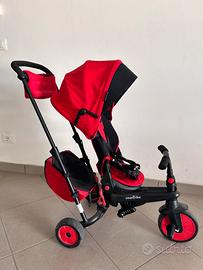 Triciclo passegino