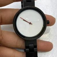 Orologio in legno elegante nero e bianco