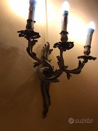 applique antica in ghisa