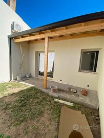 Trilocale al piano terra con cortile