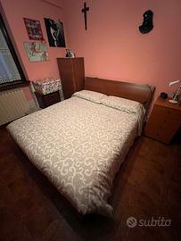 Letto matrimoniale contenitore.