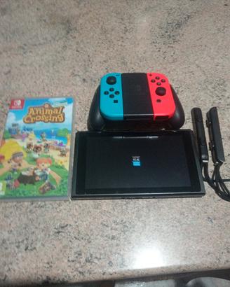 NINTENDO SWITCH  COMPLETA+GIOCO+128GB memoria