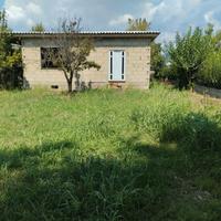 Terreno con deposito