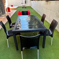 Tavolo e sedie in rattan  armadio e sdraio