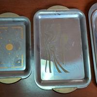 Set vassoi in acciaio decorato 