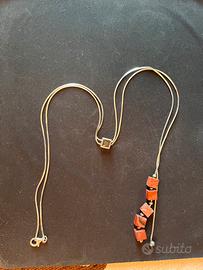 Lunga collana in acciaio con intermezzo