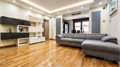 Elegante quadrilocale con posto auto