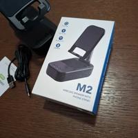 Supporto per smartphone/tablet con altoparlante