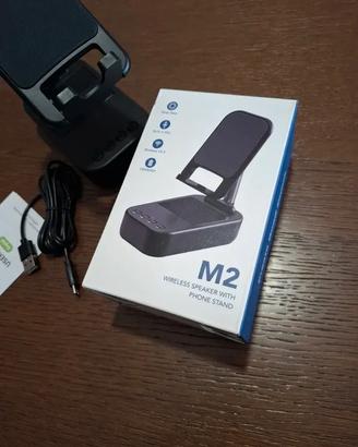 Supporto per smartphone/tablet con altoparlante