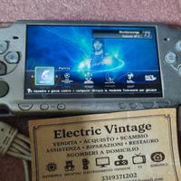0614NN-Console Sony PSP Silver con memoria e gioch