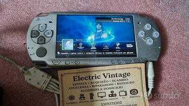 0614NN-Console Sony PSP Silver con memoria e gioch