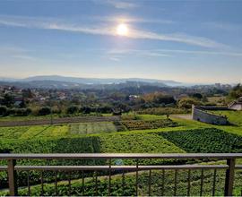 Bifamiliare con giardino e vista mare