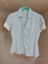 Camicia donna manica corta con profili bianchi.