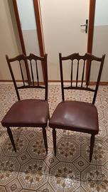 Due sedie legno intarsiato e similpelle poss sped