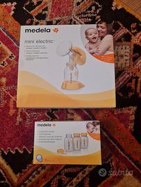 Medela mini electric e bottigliette latte materno