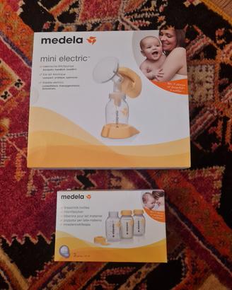 Medela mini electric e bottigliette latte materno
