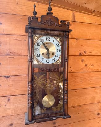 antico orologio a pendolo rolens