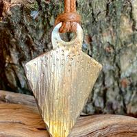 Ciondolo fatto a mano in acciaio