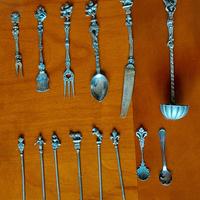 14 posatine con decorazioni varie - Anni '20