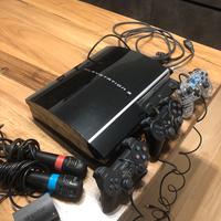 Playstation 3 con cavi, 3 joystick e 8 giochi