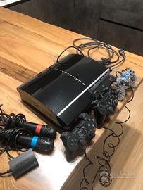 Playstation 3 con cavi, 3 joystick e 8 giochi