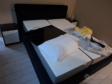 letto matrimoniale e comodini 