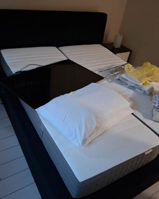letto matrimoniale e comodini 