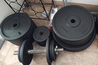 Attrezzatura palestra pesi bilanciere dischi ghisa