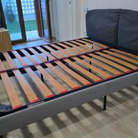 rete matrimoniale con bordo e testata imbottita