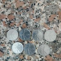sette monete da 50 lire