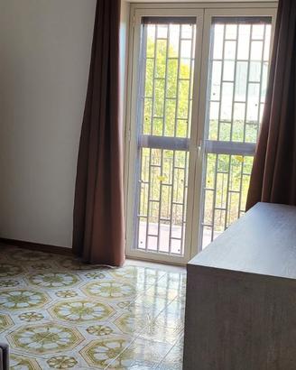 Stanze singole in complesso residenziale