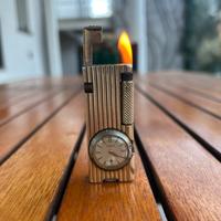 Accendino vintage con orologio