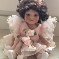 Bambola da collezione vestito rosa